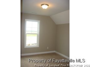 Lot 104 Carl Steiner Road Fayetteville, NC 28311 - Photo 14 of 15 a view of an empty room with a window