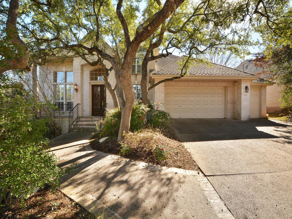 10551 Indigo Broom Loop Austin, TX 78733 - Photo 1 of 1 a view of backyard with large tree