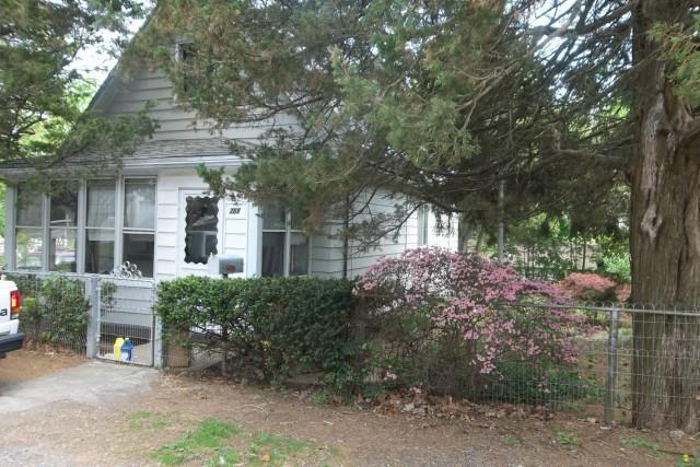 268 Dayton Road Bridgeport, CT 06606 - Photo 1 of 1 front view of a house with a tree