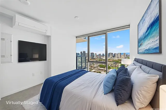 a bed sitting in a bedroom next to a window