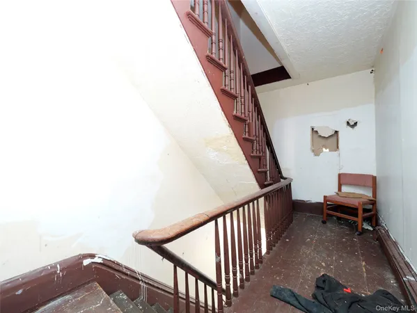 a view of entryway with stairs