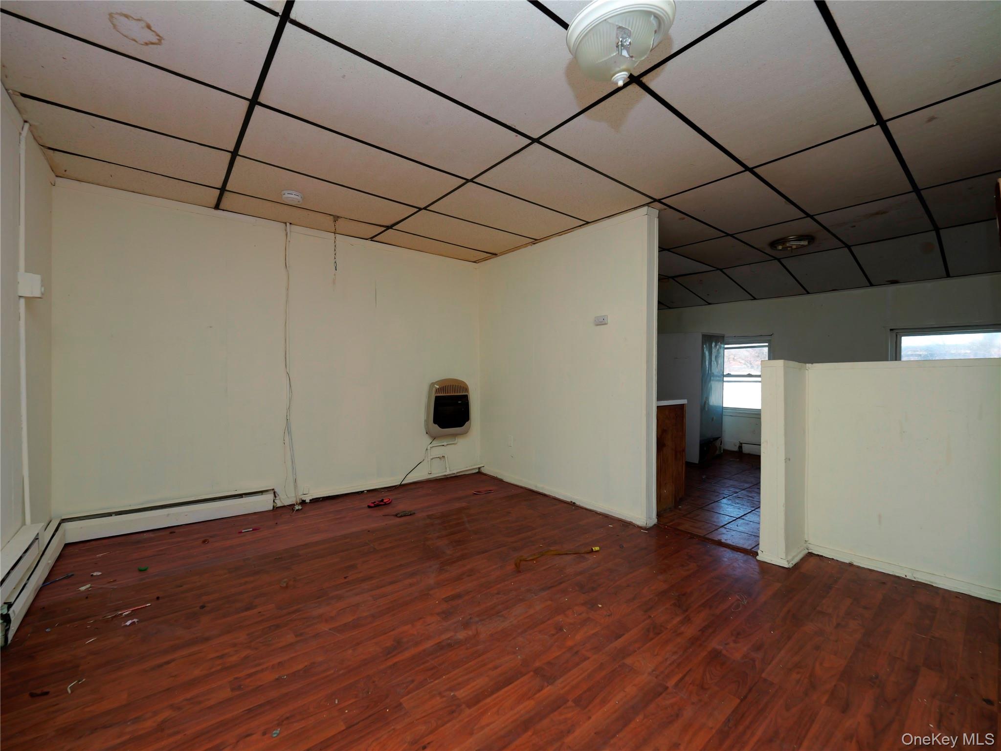 170 Chambers Street Newburgh, NY 12550 - Photo 17 of 49 a view of an empty room with wooden floor
