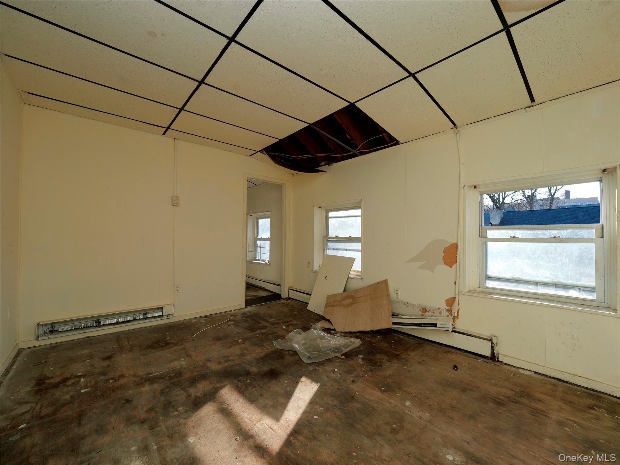 170 Chambers Street Newburgh, NY 12550 - Photo 24 of 49 a living room with a couch and a window