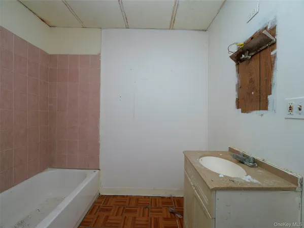 a bathroom with a sink and a bathtub