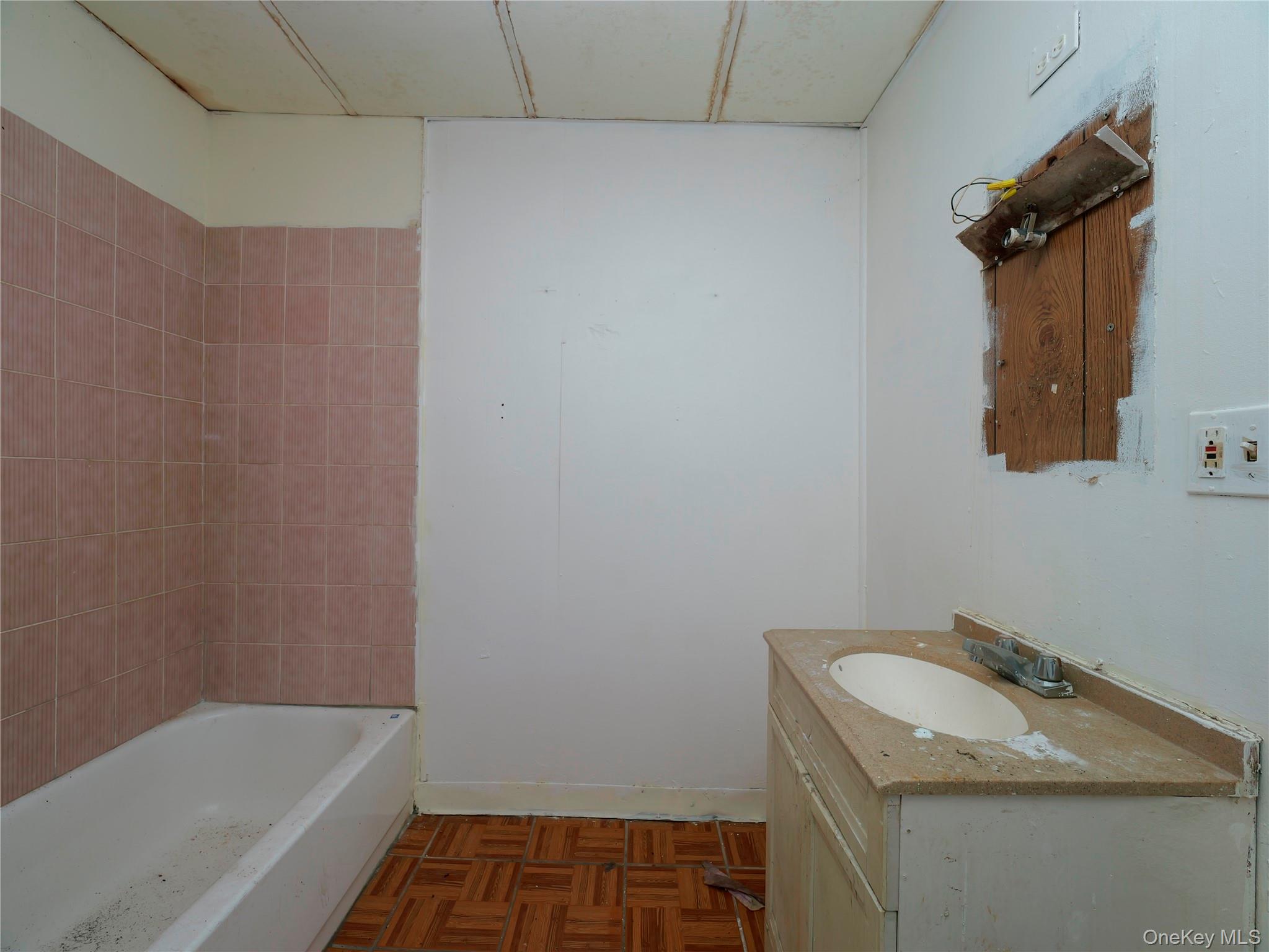 170 Chambers Street Newburgh, NY 12550 - Photo 28 of 49 a bathroom with a sink and a bathtub