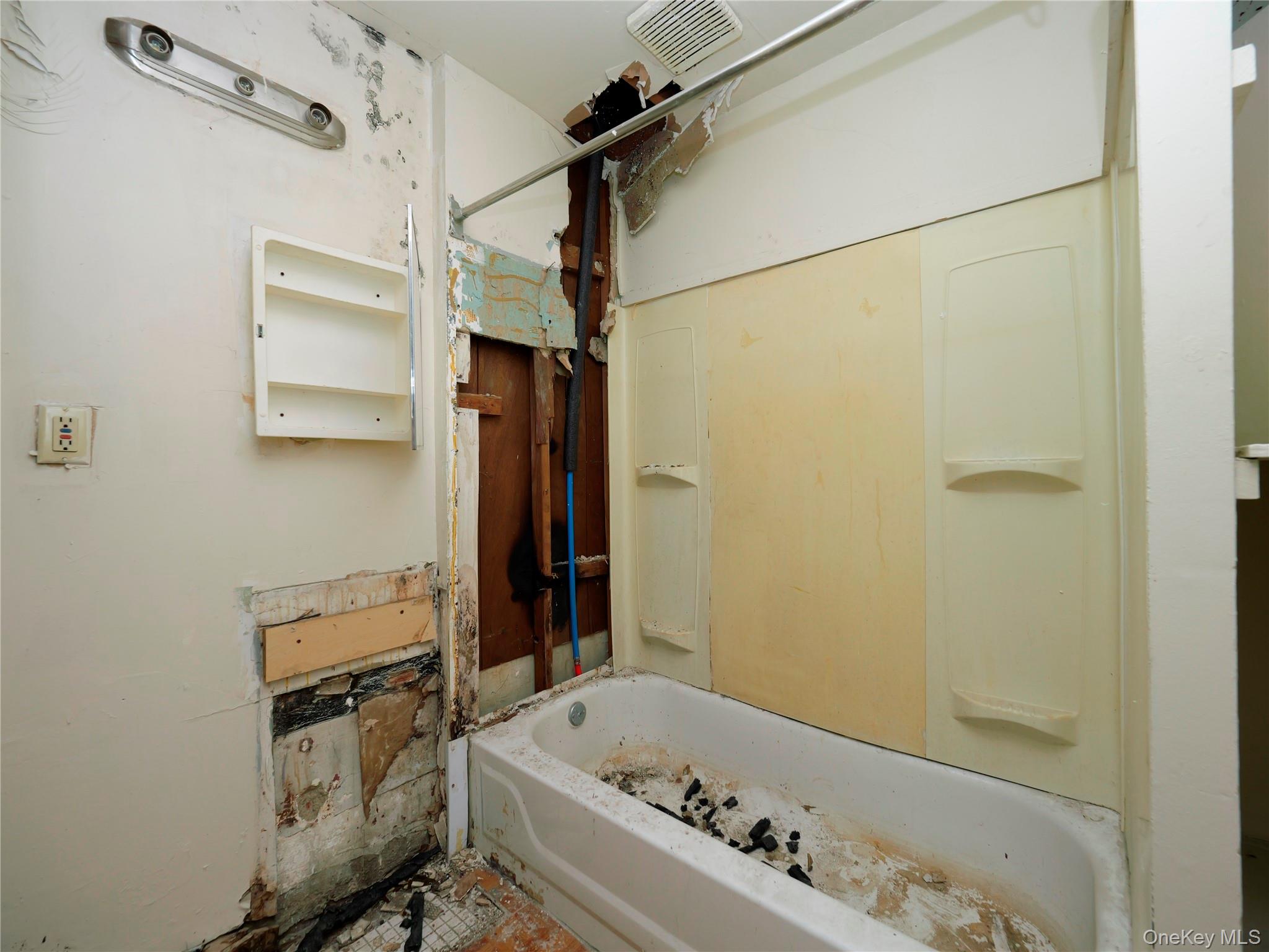 170 Chambers Street Newburgh, NY 12550 - Photo 35 of 49 a bathroom with a tub a sink and a shower