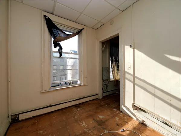 a view of an empty room and window