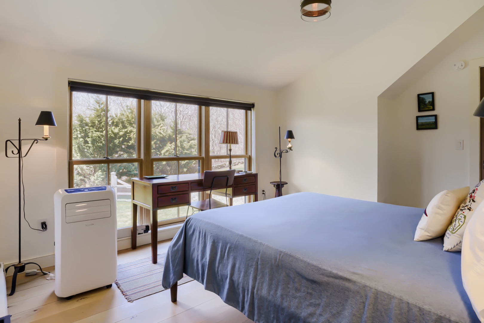 9 Ridge Hill Road Chilmark, MA 02535 - Photo 44 of 48 a bedroom with a bed and a large window