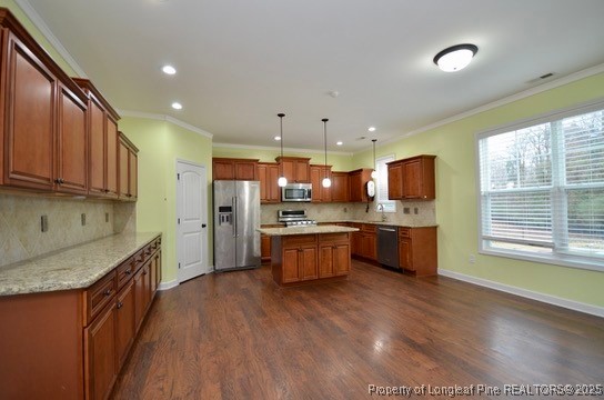 281 Ganton Drive Raeford, NC 28376 - Photo 13 of 50 a large kitchen with a large counter top stainless steel appliances and cabinets