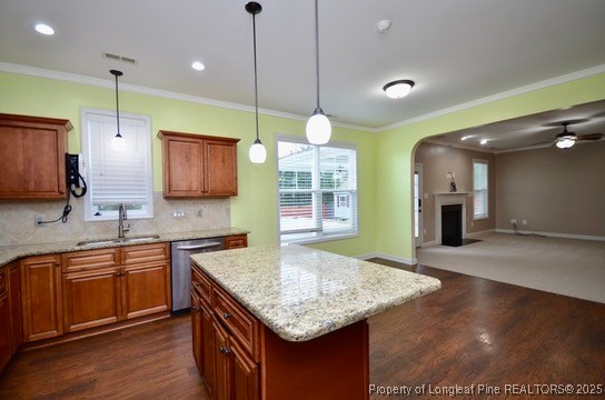 281 Ganton Drive Raeford, NC 28376 - Photo 20 of 50 a kitchen with stainless steel appliances granite countertop a sink a stove and a wooden floors