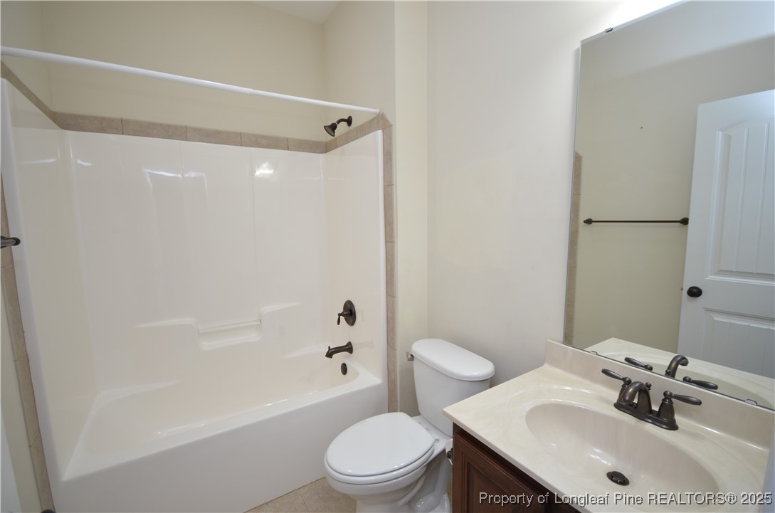 281 Ganton Drive Raeford, NC 28376 - Photo 25 of 50 a bathroom with a sink toilet and shower