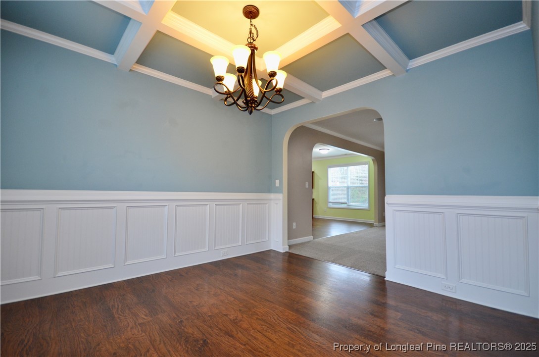 281 Ganton Drive Raeford, NC 28376 - Photo 3 of 50 a view of a room with wooden floors and chandelier