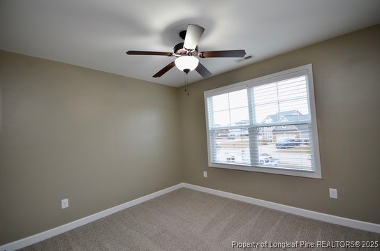 281 Ganton Drive Raeford, NC 28376 - Photo 36 of 50 an empty room with windows and fan