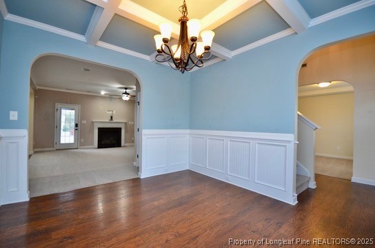281 Ganton Drive Raeford, NC 28376 - Photo 4 of 50 a view of a hallway with wooden floor and a chandelier