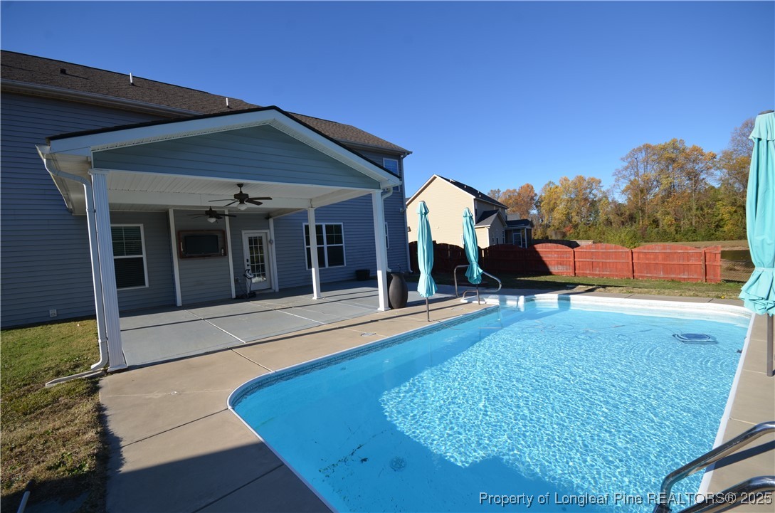 281 Ganton Drive Raeford, NC 28376 - Photo 50 of 50 a view of a house with backyard porch and sitting area