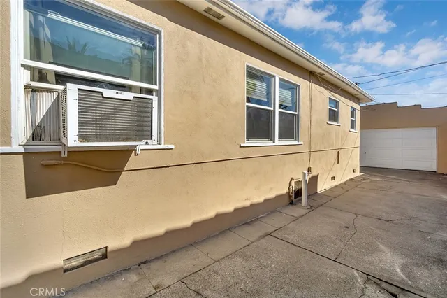 a view of a house with a large window