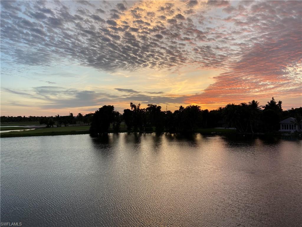610 Banyan Circle Naples, FL 34102 - Photo 6 of 6 a view of lake and mountain