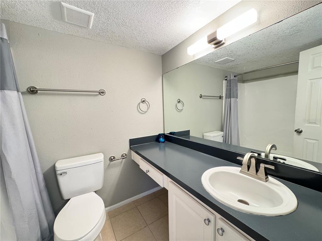 120 Blue Pointe Way, Unit 320 Altamonte Springs, FL 32701 - Photo 17 of 27 a bathroom with a sink and a toilet