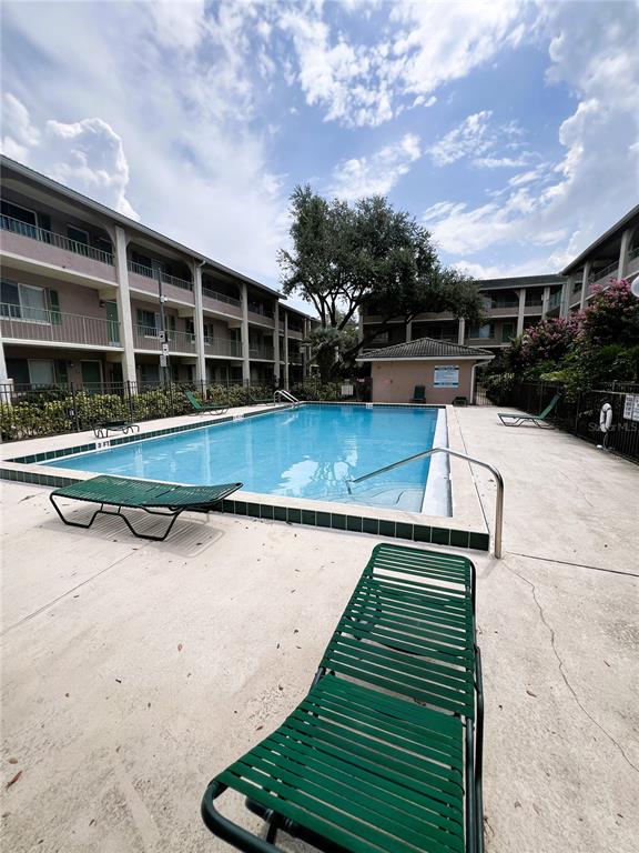 120 Blue Pointe Way, Unit 320 Altamonte Springs, FL 32701 - Photo 21 of 27 a view of swimming pool with a lounge chairs