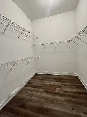 a view of a room with racks on the wall