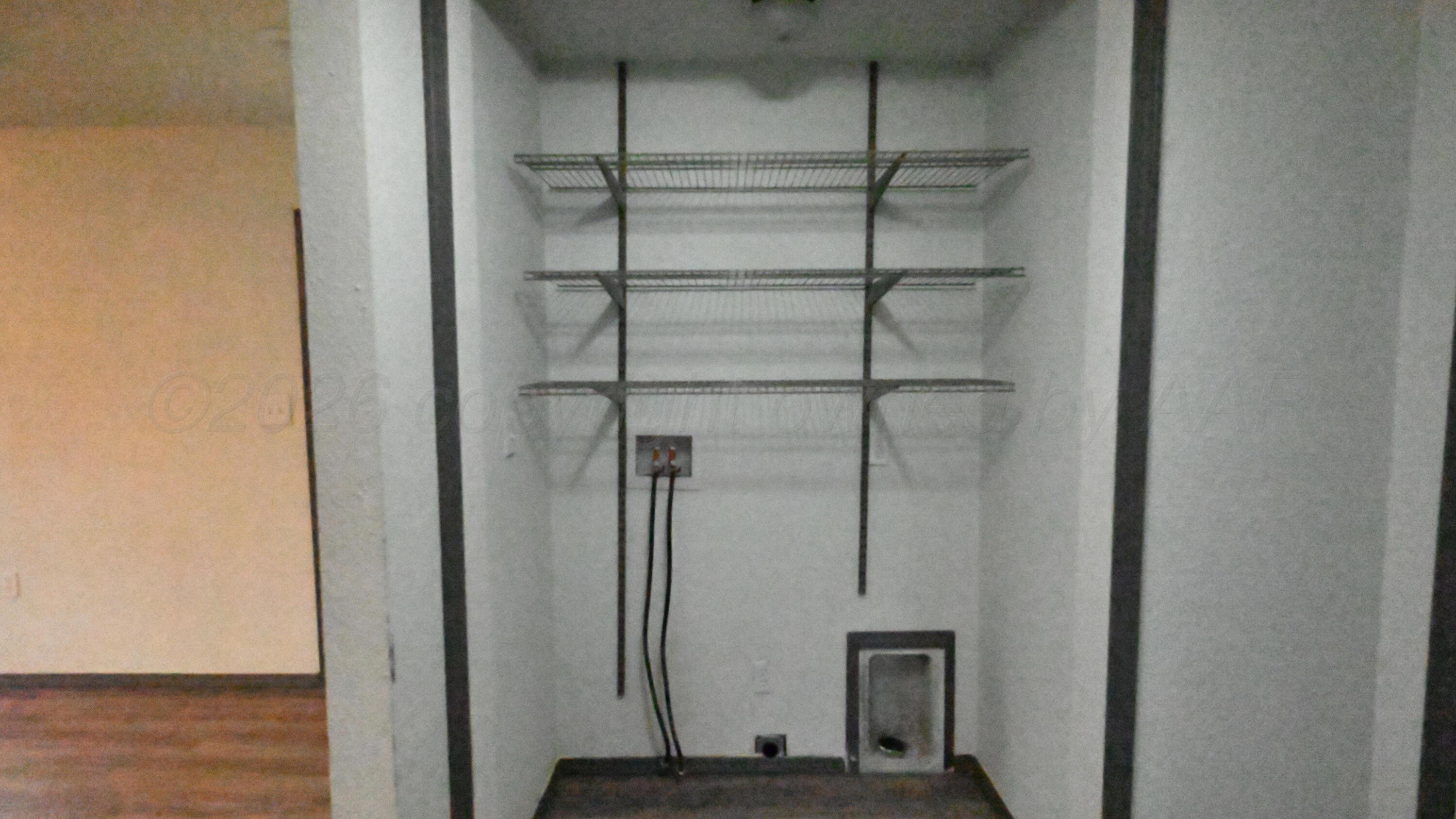 306 Union Street Borger, TX 79007 - Photo 11 of 12 a view of an empty walk in closet