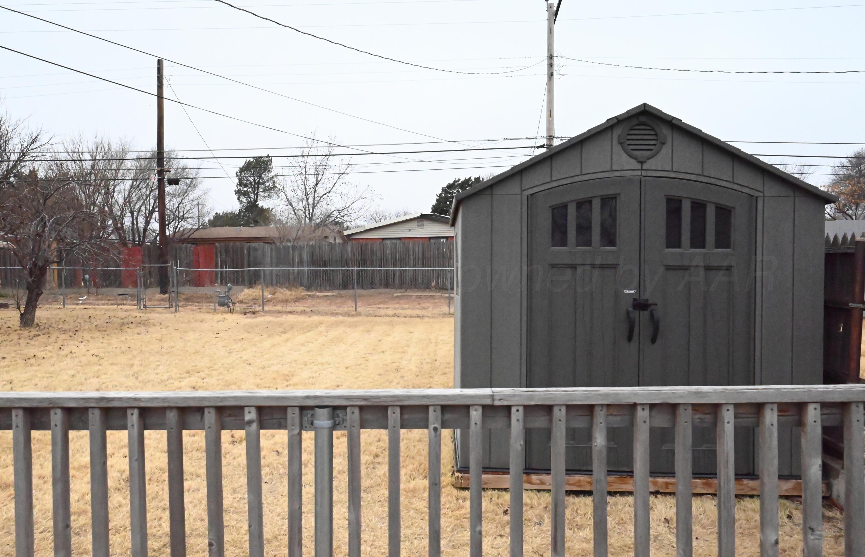 306 Union Street Borger, TX 79007 - Photo 12 of 12 a view of a small yard next to a large window