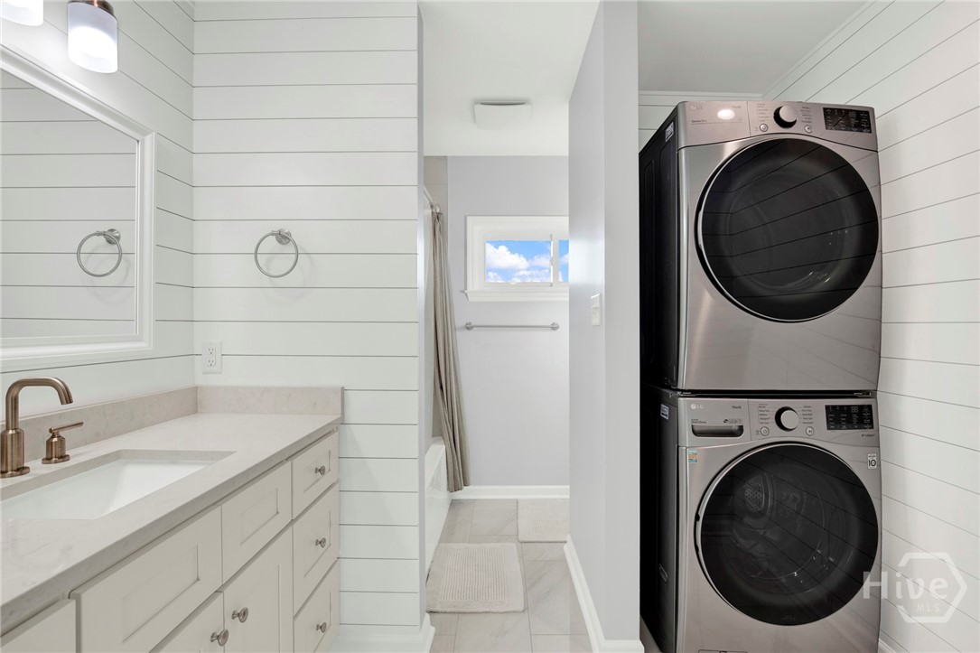 5 Lighthouse Lane, Unit A Tybee Island, GA 31328 - Photo 29 of 40 Hall bath w/ laundry