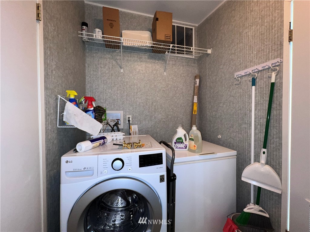 58 Heron Loop Road Republic, WA 99166 - Photo 13 of 30 a utility room with dryer and washer