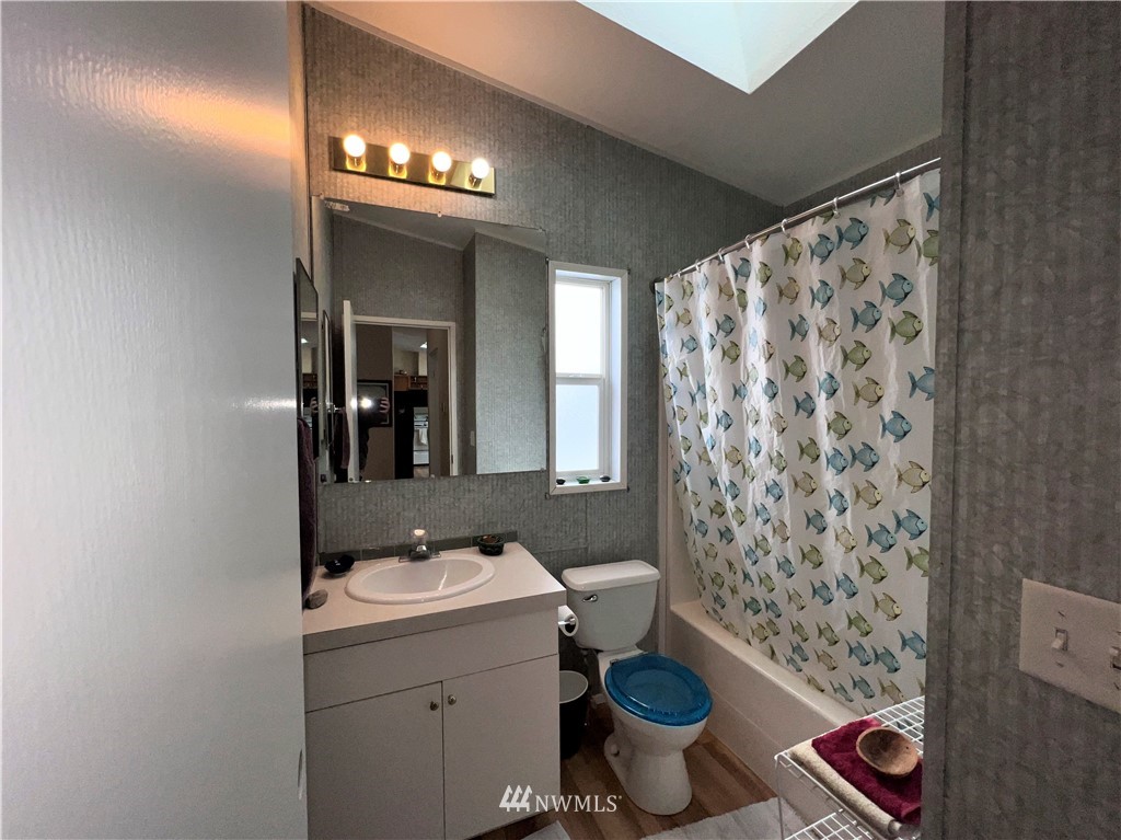 58 Heron Loop Road Republic, WA 99166 - Photo 15 of 30 a bathroom with a sink and a mirror