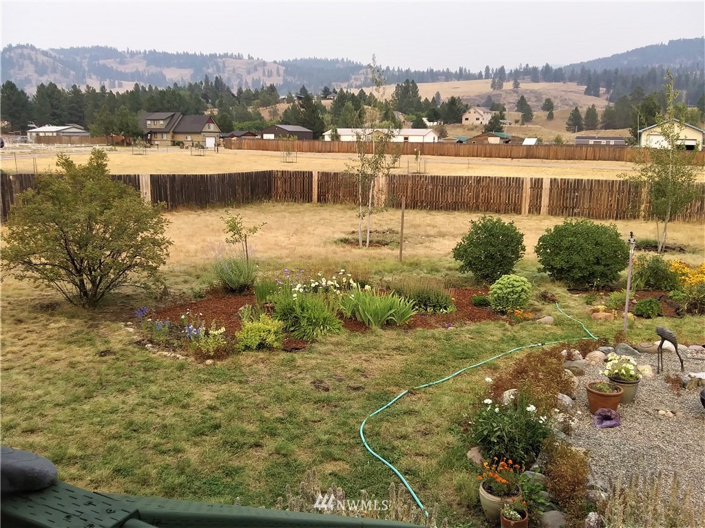 58 Heron Loop Road Republic, WA 99166 - Photo 22 of 30 a view of a lake with a mountain