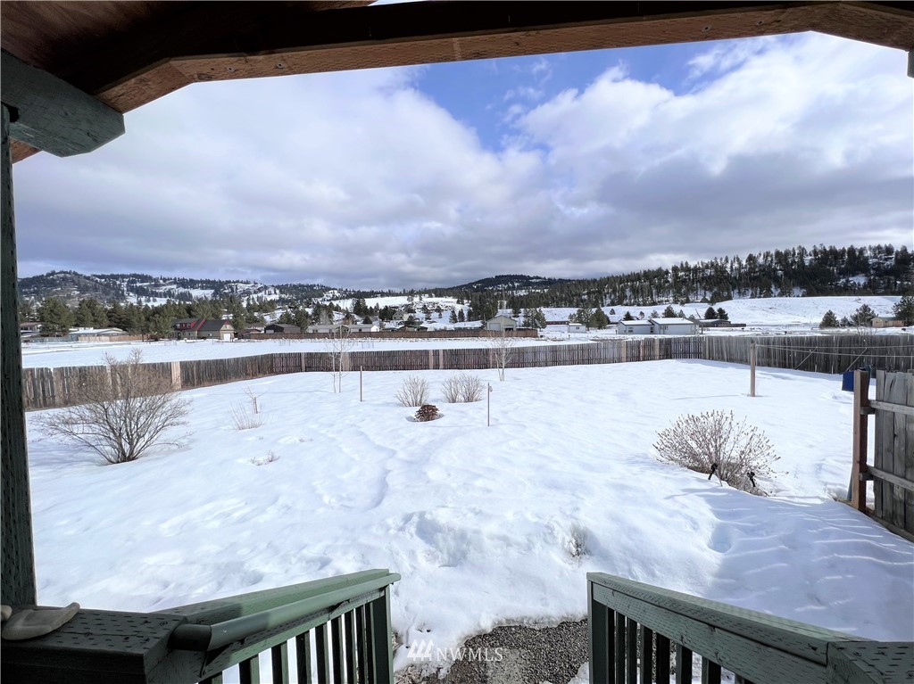 58 Heron Loop Road Republic, WA 99166 - Photo 25 of 30 a view of swimming pool with outdoor seating and city view
