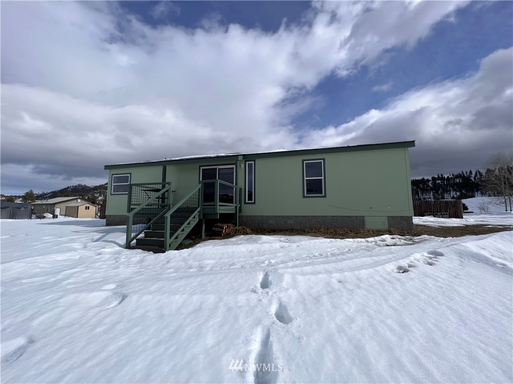58 Heron Loop Road Republic, WA 99166 - Photo 29 of 30 a view of the house with a yard