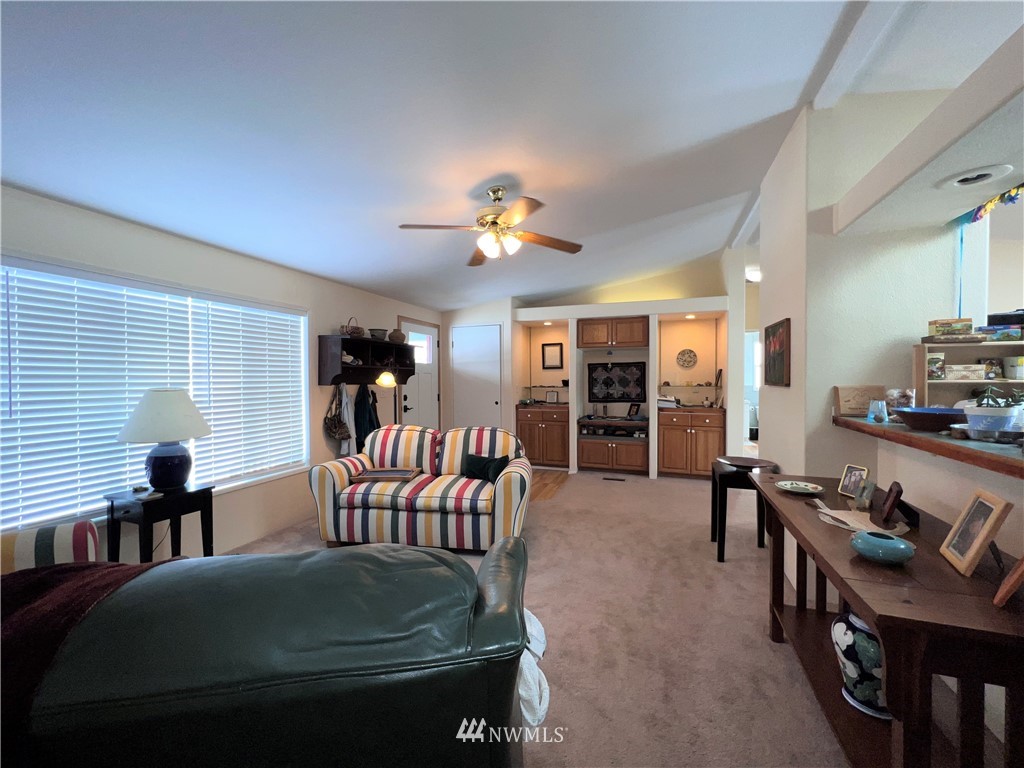 58 Heron Loop Road Republic, WA 99166 - Photo 6 of 30 a living room with furniture and a dining table