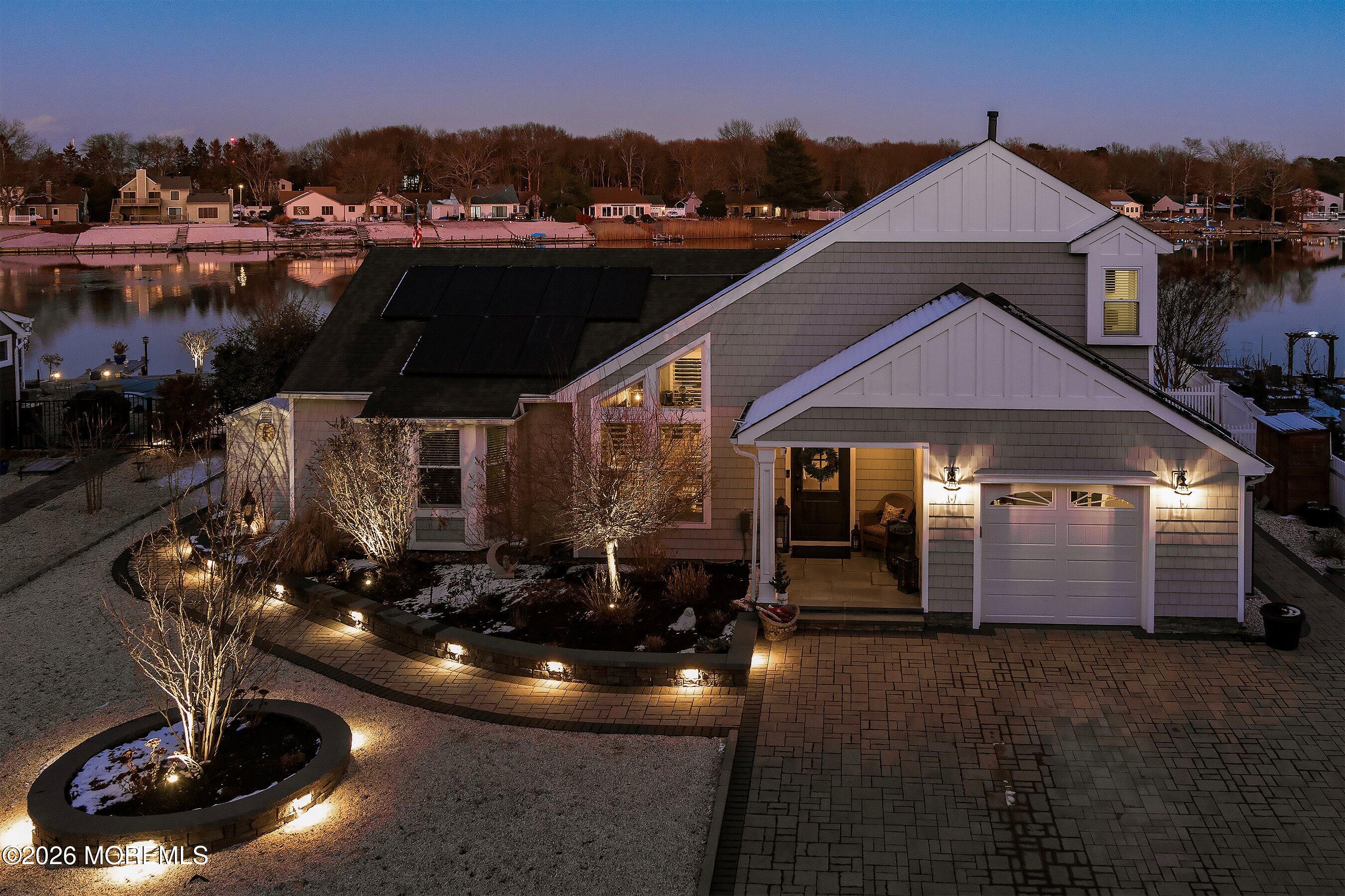 261 Timberlake Drive Manahawkin, NJ 08050 - Photo 2 of 64 a view of a house with a yard and balcony