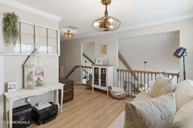 a en suite bathroom with a toilet sink and mirror