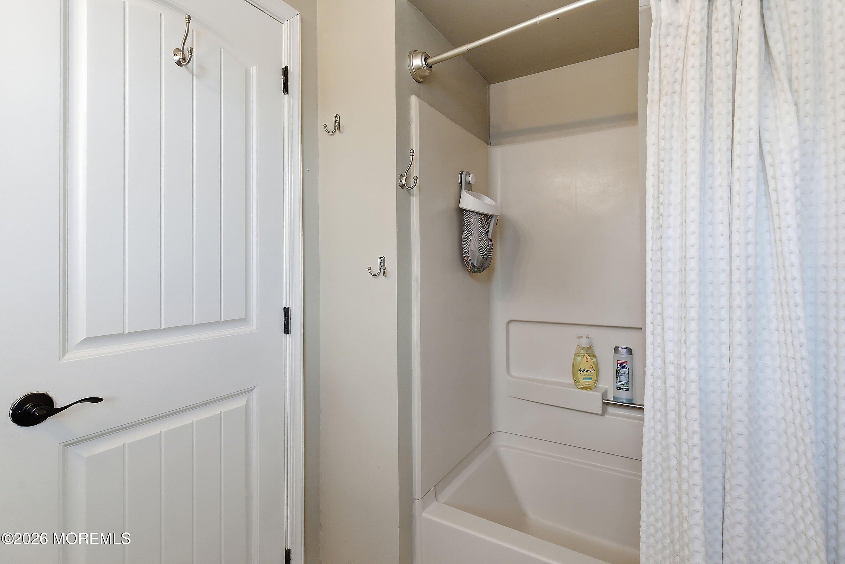 261 Timberlake Drive Manahawkin, NJ 08050 - Photo 32 of 64 a bathroom with a shower