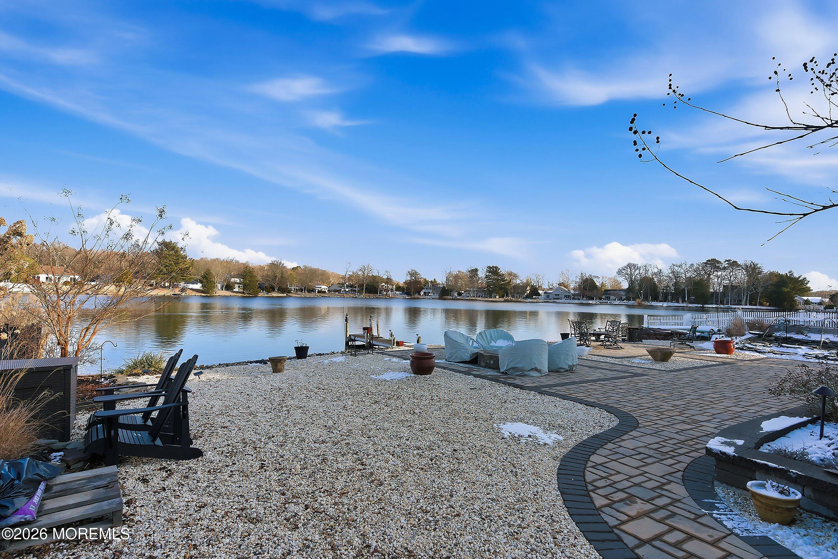 261 Timberlake Drive Manahawkin, NJ 08050 - Photo 37 of 64 a view of a lake with houses