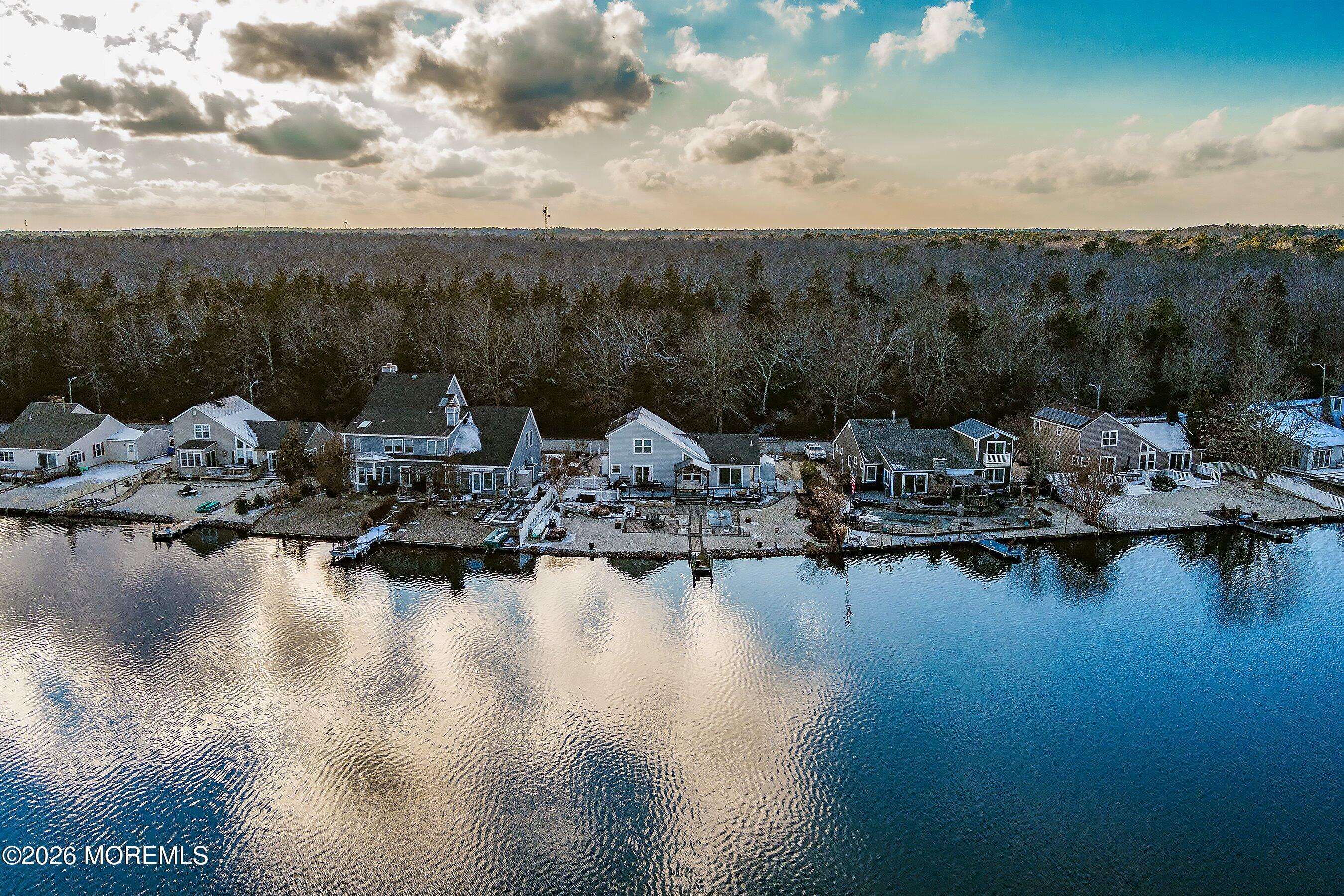 261 Timberlake Drive Manahawkin, NJ 08050 - Photo 44 of 64 a view of a lake with boats and trees