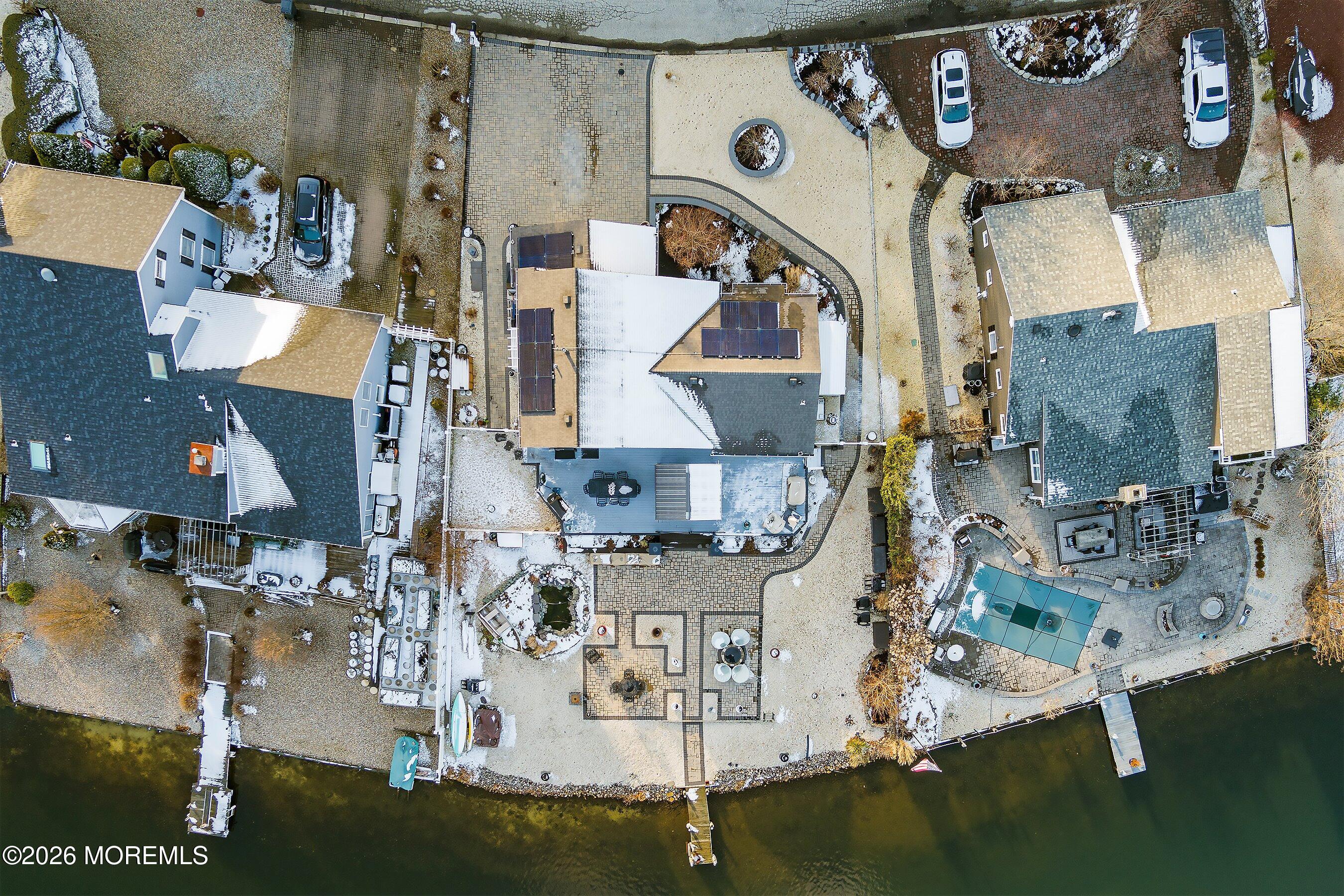 261 Timberlake Drive Manahawkin, NJ 08050 - Photo 46 of 64 an aerial view of residential houses with outdoor space and parking