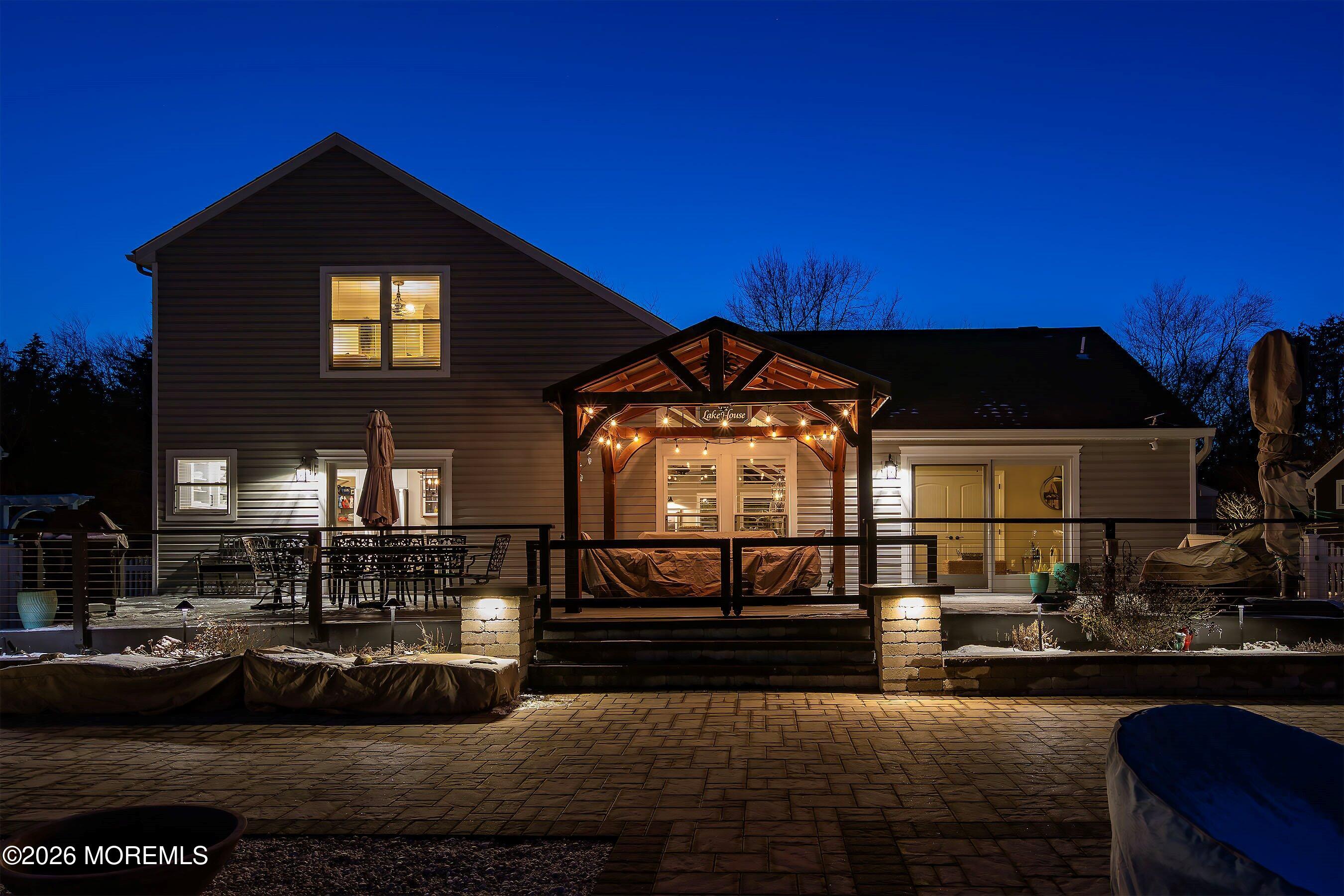 261 Timberlake Drive Manahawkin, NJ 08050 - Photo 54 of 64 a front view of a house with a yard