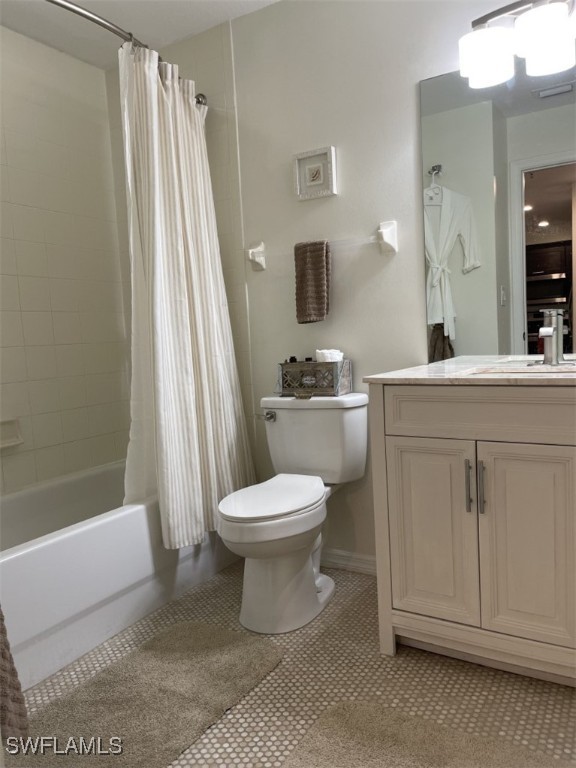 4440 Botanical Pl Circle, Unit 102 Naples, FL 34112 - Photo 13 of 21 a bathroom with a toilet sink and shower