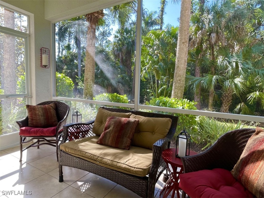 4440 Botanical Pl Circle, Unit 102 Naples, FL 34112 - Photo 15 of 21 a view of a chair in the roof deck