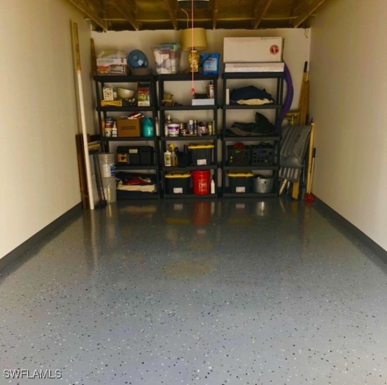 4440 Botanical Pl Circle, Unit 102 Naples, FL 34112 - Photo 17 of 21 a view of store room with racks