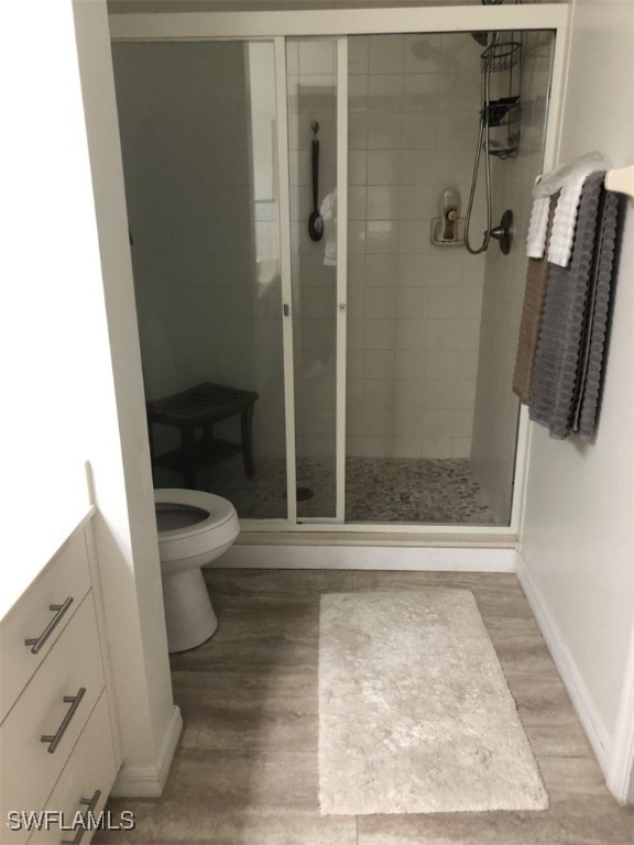 4440 Botanical Pl Circle, Unit 102 Naples, FL 34112 - Photo 8 of 21 a bathroom with a shower