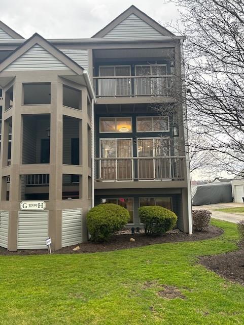 1099 Riverside Drive, Unit H Beaver, PA 15009 - Photo 1 of 27 a front view of a house with a yard