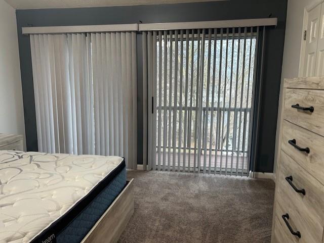 1099 Riverside Drive, Unit H Beaver, PA 15009 - Photo 19 of 27 a view of a bedroom with a bed and a window
