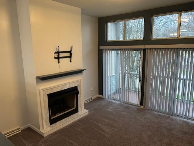 1099 Riverside Drive, Unit H Beaver, PA 15009 - Photo 4 of 27 a view of a livingroom with an empty space and a fireplace