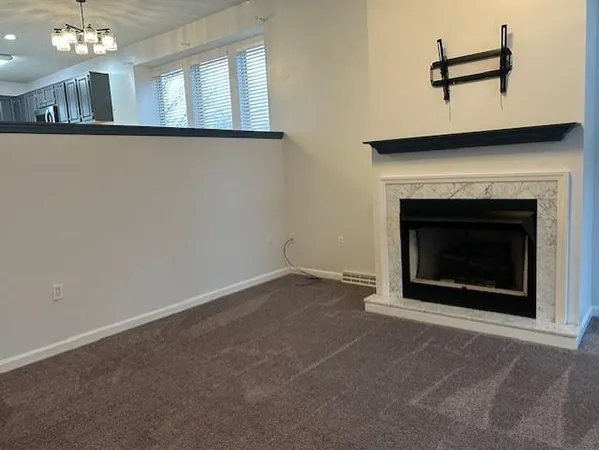 a living room with a fireplace