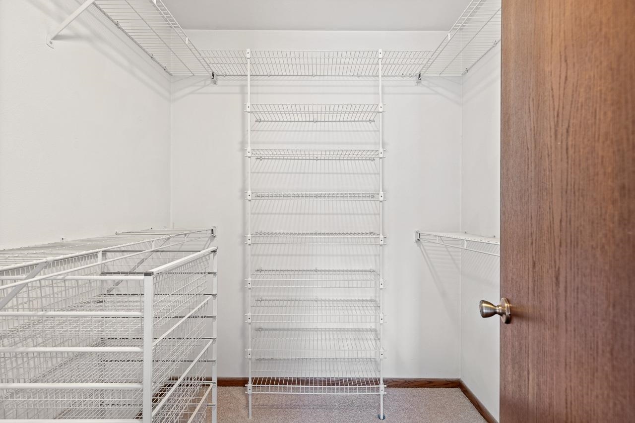 3442 North Trainer Road Rockford, IL 61114 - Photo 24 of 35 a view of walk in closet with empty racks
