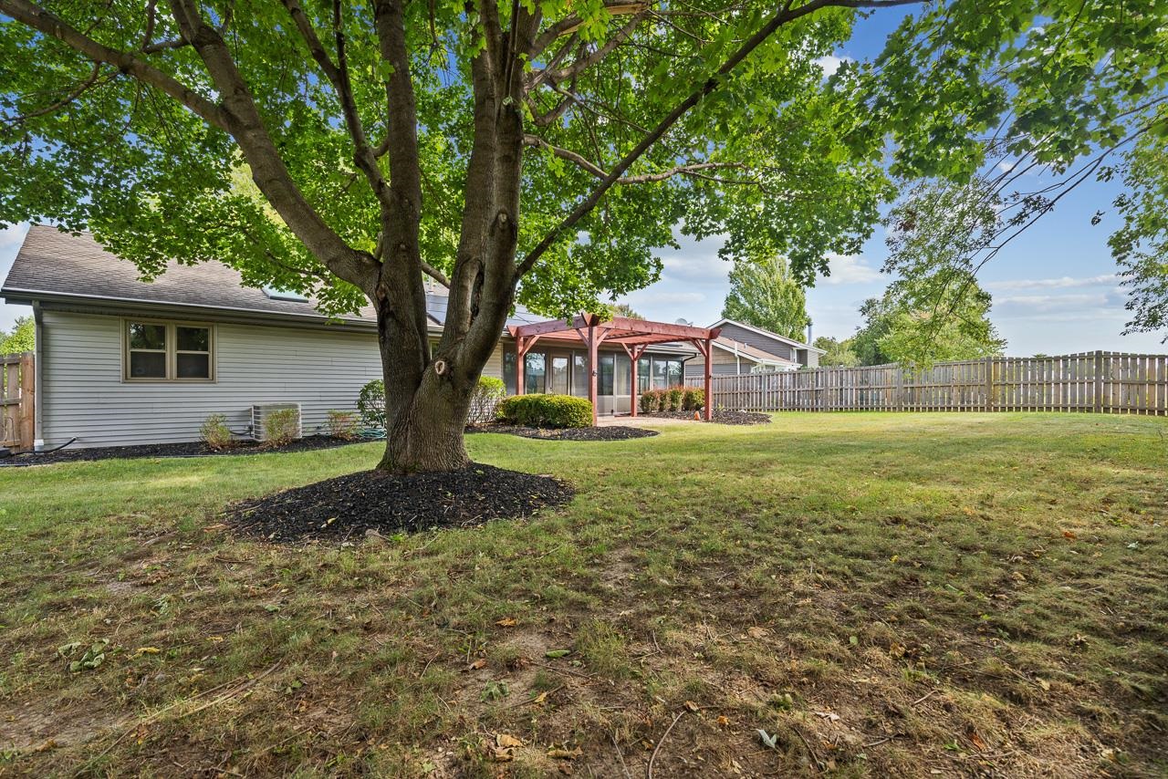 3442 North Trainer Road Rockford, IL 61114 - Photo 32 of 35 a front view of a house with garden